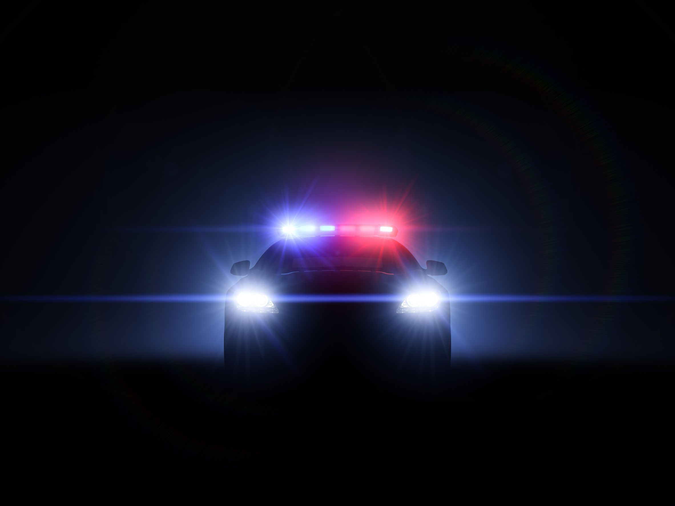 18478062 - police car with full array of lights - Lighthouse Legal Services